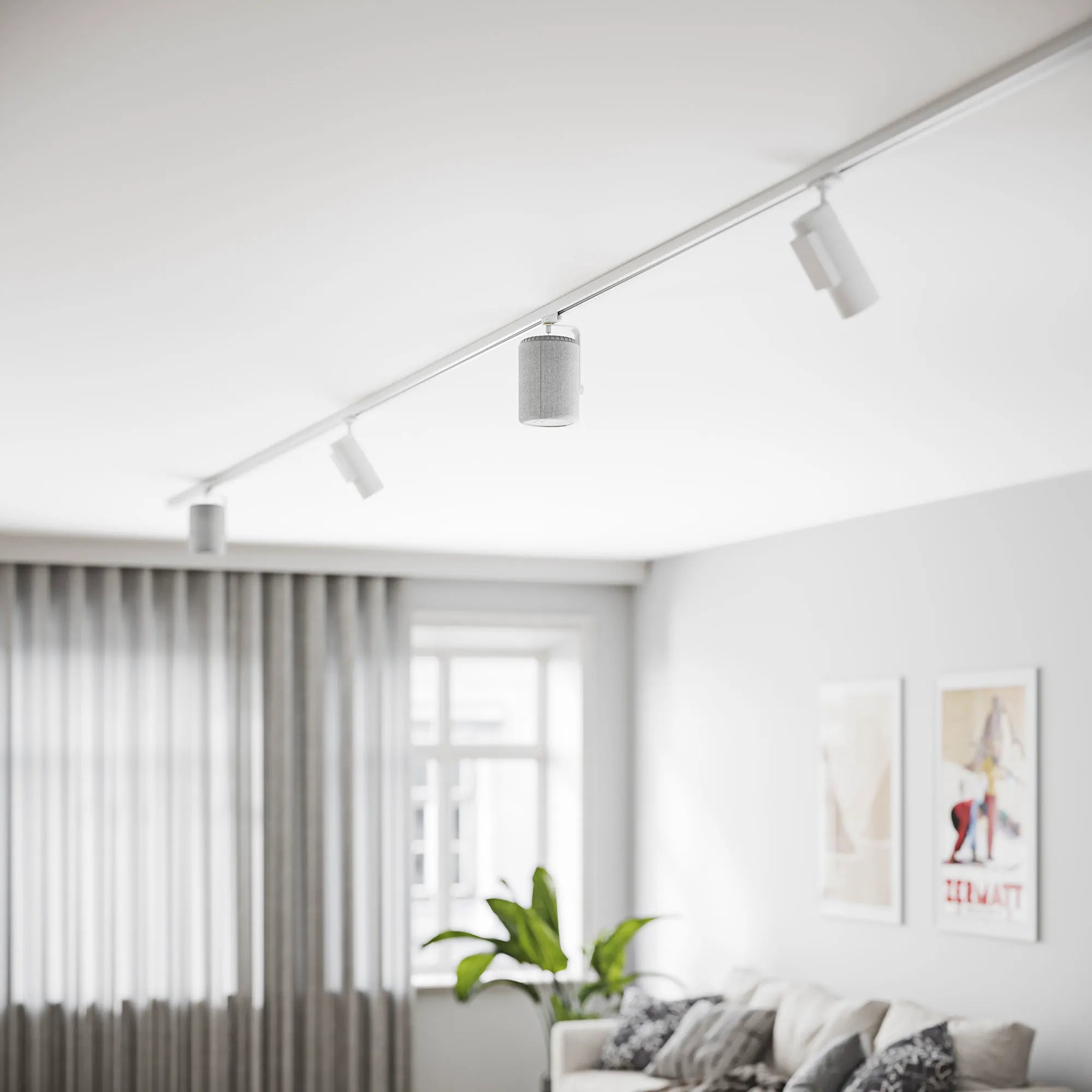 Audio Pro TM10 Track Mount mit A10 Lautsprecher in weißer Deckenschiene in modernem, hellem Wohnzimmer